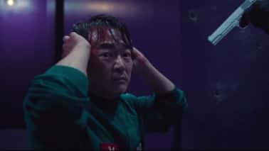 Gi-hun leads a bold rebellion, seizing weapons, fighting guards, and storming the control room in the last few episodes of Season 2. In a shocking moment, Jung-bae, a loyal friend to the end, is executed right before Gi-hun’s eyes.