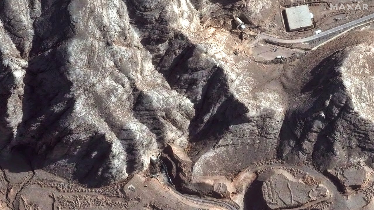 This handout satellite picture provided shows damage caused by recent airstrikes on nearby tunnel entrances near Isfahan nuclear enrichment facility in central Iran.