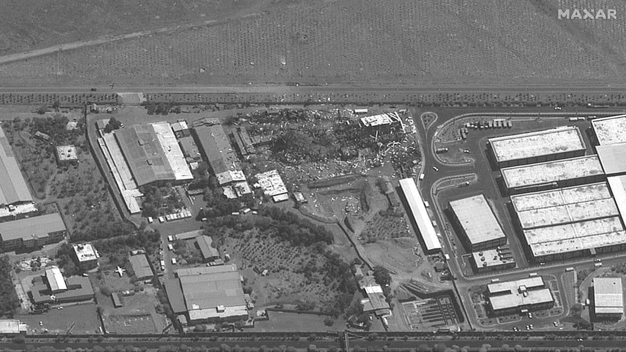 This handout satellite picture provided by Maxar Technologies shows destroyed buildings adjacent to Mehrabad International Airport in Tehran. 