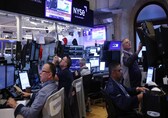 Wall Street lower as tariff uncertainty weighs on stocks, dollar rises on weakness in EM currencies