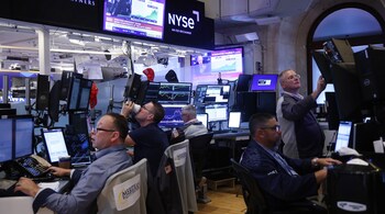 US futures inch up as tech stabilises; Asia mixed, Europe rises on M&A, Fed signals