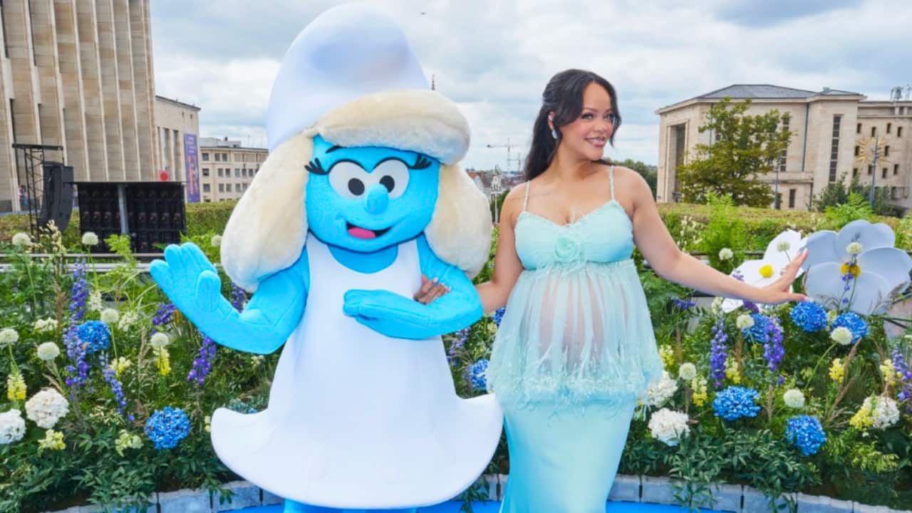 Rihanna channels Smurfette in blue as she attends The Smurfs Movie world premiere in Brussels