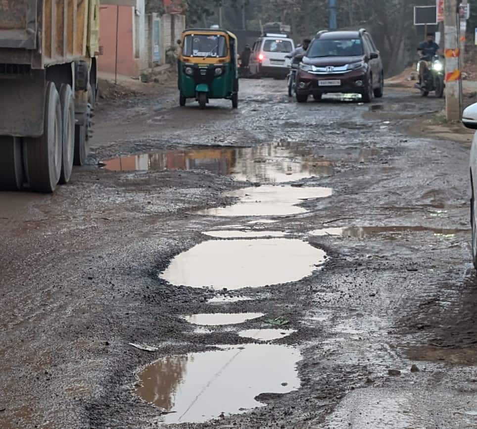 Bengaluru residents invoke god to fix deteriorated Holiday Village Road