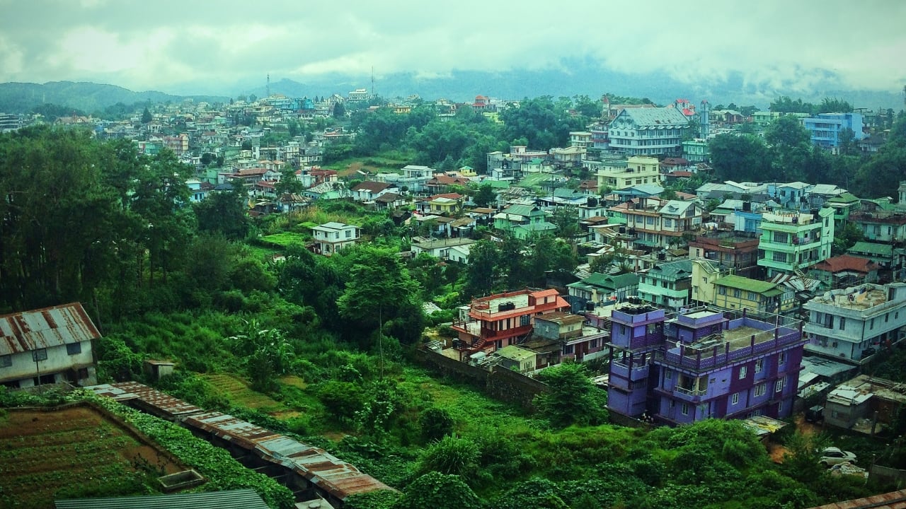 13. Shillong Often referred to as the 'Scotland of the East', Shillong in the rains is wrapped in melancholy and music. The mist rolls in like a lullaby, the pine trees whisper, and cafés brim with conversation and comfort. (Image: Canva)