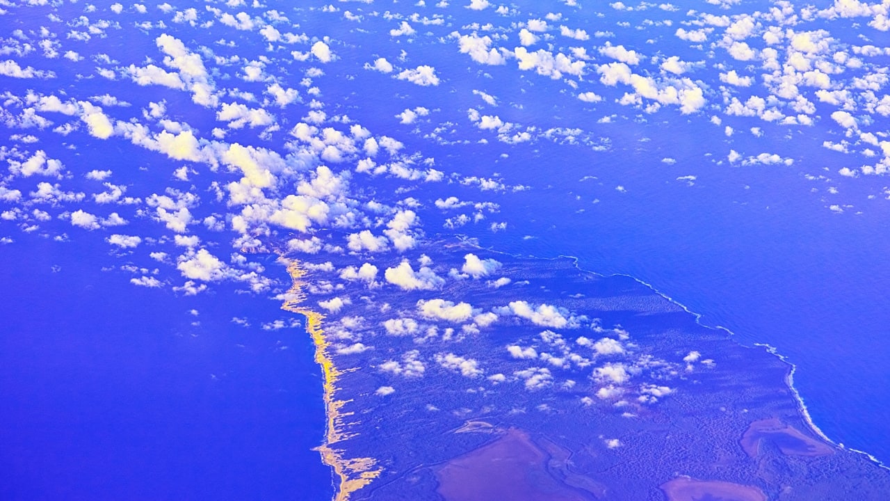 2. Niihau, Hawaii, USA Just across the channel from Kauai lies Niihau, often called “The Forbidden Island,” not for danger, but because it is privately owned and deliberately sequestered. Purchased by a wealthy family in the 19th century, Niihau prohibits outsiders, preserving traditional Hawaiian culture and the Hawaiian language without interference. Only relatives, military personnel, or specially invited guests may step ashore. (Image: Canva)