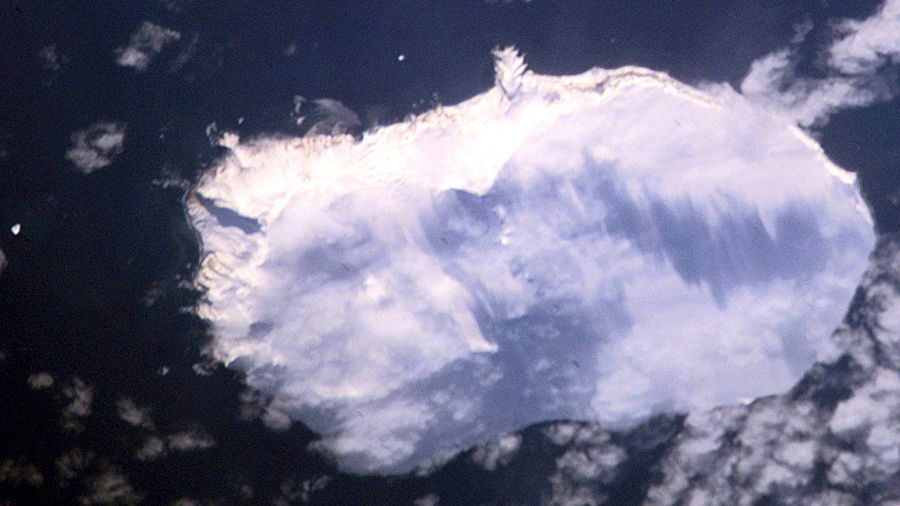 4. Bouvet Island, South Atlantic Ocean, Norway Shrouded in ice and enshrouded in clouds for most of the year, Bouvet Island is the epitome of geographic isolation. This Norwegian territory is located thousands of kilometers from any populated landmass and is so treacherous to approach that only scientific expeditions may attempt a landing. The weather is hostile, the terrain unforgiving, and the silence—absolute. (Image: NASA via Wikipedia)