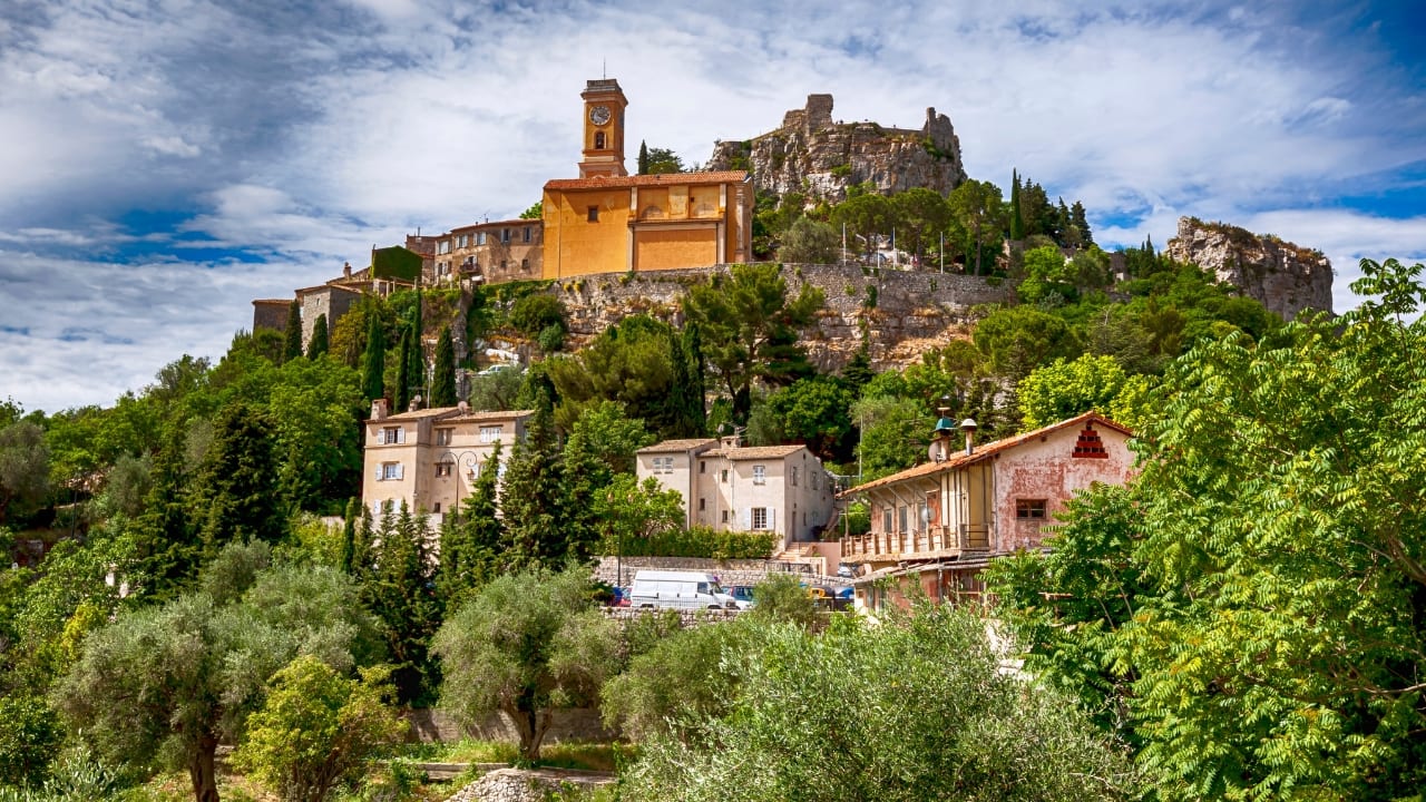 7. Eze, France High above the Riviera, where the cliffs fall into blue, sits Eze—a village of stone and shadow. Its alleys twist upward as if climbing toward memory. Time lingers here, in the scent of thyme and sea. (Image: Canva)