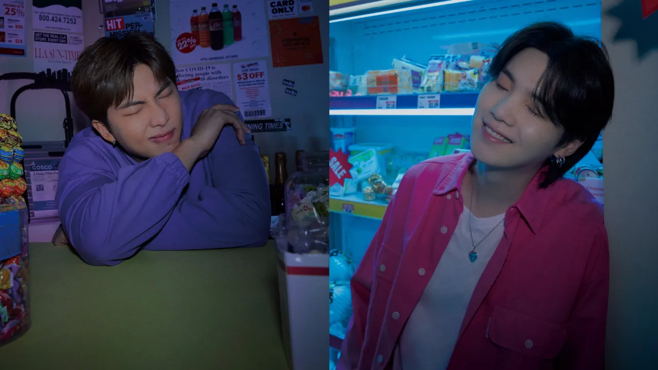 BTS band leader RM, aka Kim Namjoon, looked dapper in a violet pullover. He poses with folded arms as he is surrounded by colourful candies and retro flyers. SUGA leans with a dreamy smile near the refrigerator aisle, wearing a bright pink jacket that stands out against the blue-lit coolers. BTS band leader RM, aka Kim Namjoon, looked dapper in a violet pullover. He poses with folded arms as he is surrounded by colourful candies and retro flyers. SUGA leans with a dreamy smile near the refrigerator aisle, wearing a bright pink jacket that stands out against the blue-lit coolers.