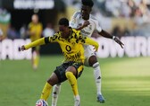 Real Madrid survive Dortmund scare to reach Club World Cup semis