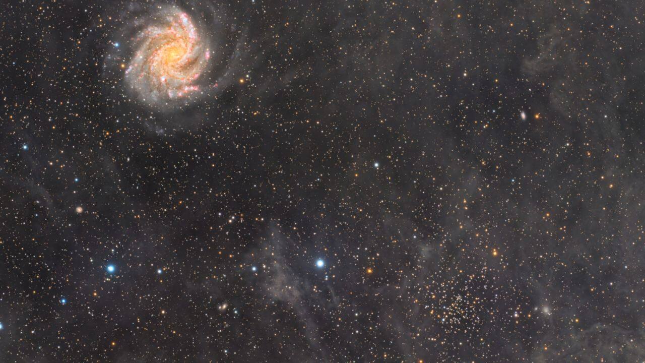 NGC 6946 and NGC 6939: In this stunning view toward Cepheus, galaxy NGC 6946 and star cluster NGC 6939 shine together. NGC 6946, the &quot;Fireworks Galaxy,&quot; is famed for its unusually frequent supernovae. (Image: NASA)