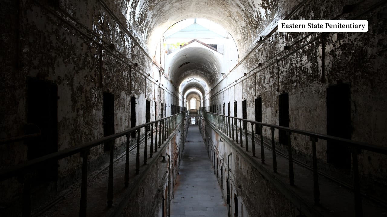 2. Eastern State Penitentiary, USA In Philadelphia’s heart, this crumbling Gothic prison once pioneered solitary confinement—and paid dearly for it. Former guards whisper of shadowy forms darting across cellblock walls. Guests speak of unseen touches and murmurs in long-abandoned corridors. Restoration has not dulled its sinister edge. (Image: Canva)