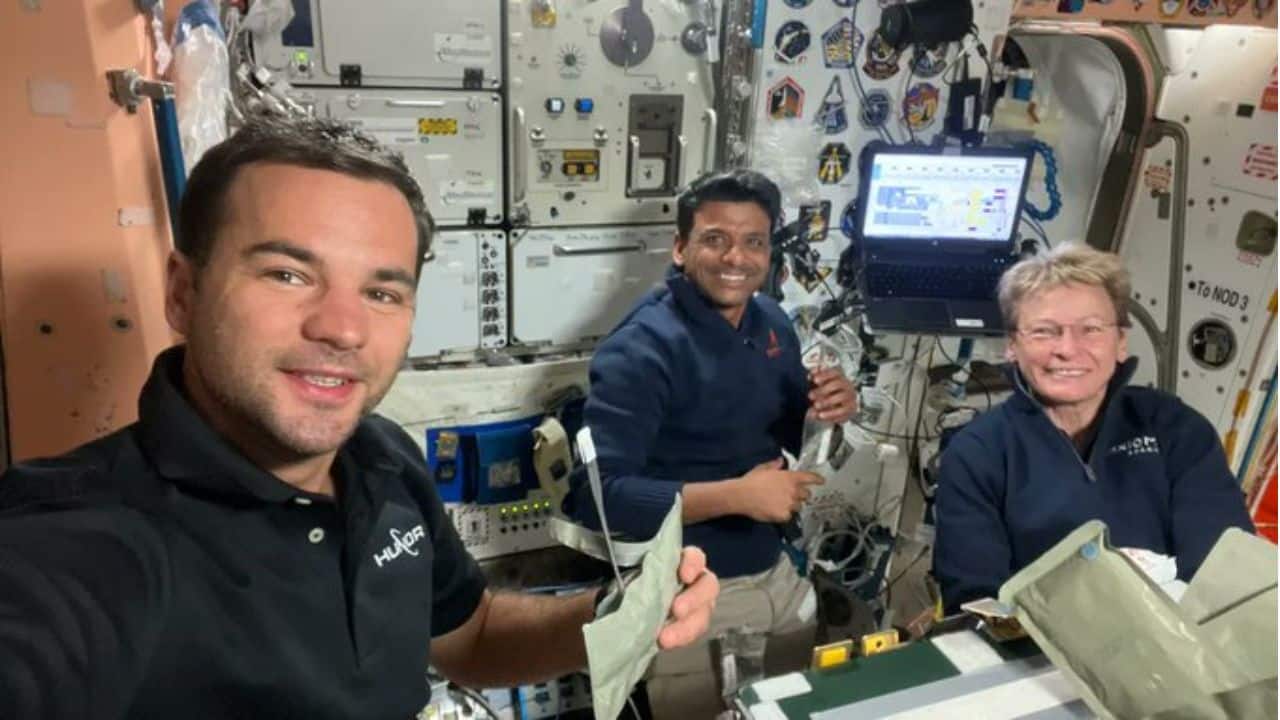 Selfie and Meal: Ax-4 Mission Specialist Tibor Kapu takes a selfie with Commander Peggy Whitson and Pilot Shubhanshu Shukla while they enjoy a meal aboard the International Space Station. (Image: Axiom Space)