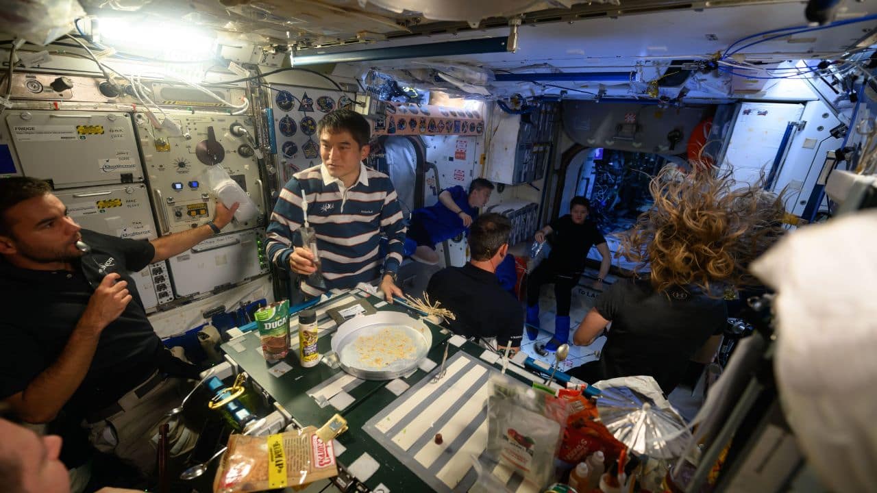 Bonding Over Biryani and Laughter: Shukla and the crew bonded over a special space meal. The moment reflected camaraderie, joy, and the spirit of international cooperation aboard the ISS. (Image: Axiom Space)