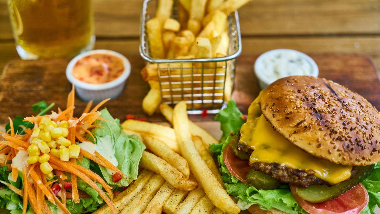 Study reveals fast foods like hot dogs and fizzy drinks are shortening your lifespan