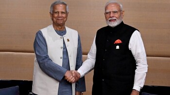 In this handout photograph taken and released by Bangladesh's Chief Advisor Office of Interim Government on April 4, 2025, Prime Minister Narendra Modi (R) shakes hands with de facto Bangladeshi leader and Nobel laureate Muhammad Yunus during their bilateral meeting on sidelines of the BIMSTEC Summit in Bangkok, Thailand.