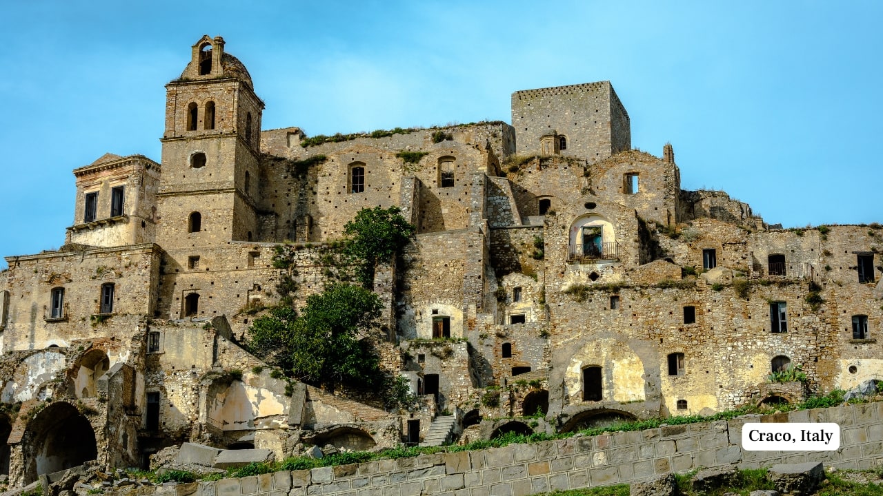 6. Craco, Italy Craco’s history stretches back to the 8th century, but landslides and earthquakes in the mid-20th century forced its residents to flee. Left deserted, its sun-bleached stone structures remain untouched by modern development. Film crews and curious travelers now wander its alleyways, captivated by its medieval stillness. (Image: Canva)