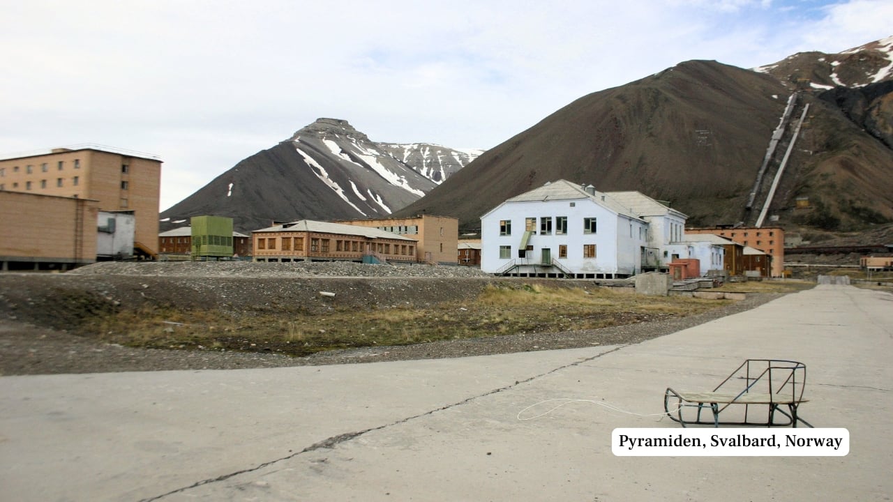 7. Pyramiden, Svalbard, Norway This Soviet mining town above the Arctic Circle was once a thriving community of 1,000. After its abrupt closure in 1998, it was left virtually untouched. Today, with its abandoned swimming pool, Lenin statue, and polar wilderness, it welcomes guided tours offering a rare look at Arctic life frozen in time. (Image: Canva)