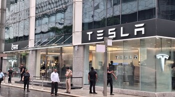 Musk's electric vehicle maker posted the worst quarterly sales decline in more than a decade and profit that missed Wall Street targets
