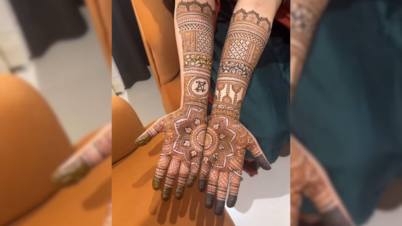 Include small bridal touches like bangles, dhol or dulhan motifs for a festive and detailed Teej vibe. (image: Pinterest)