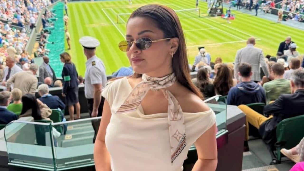 The actress shared glimpses of her time at the event, including a stunning photo against a Wimbledon-themed backdrop and a vibrant image from the stands at Centre Court as the match unfolded. 
