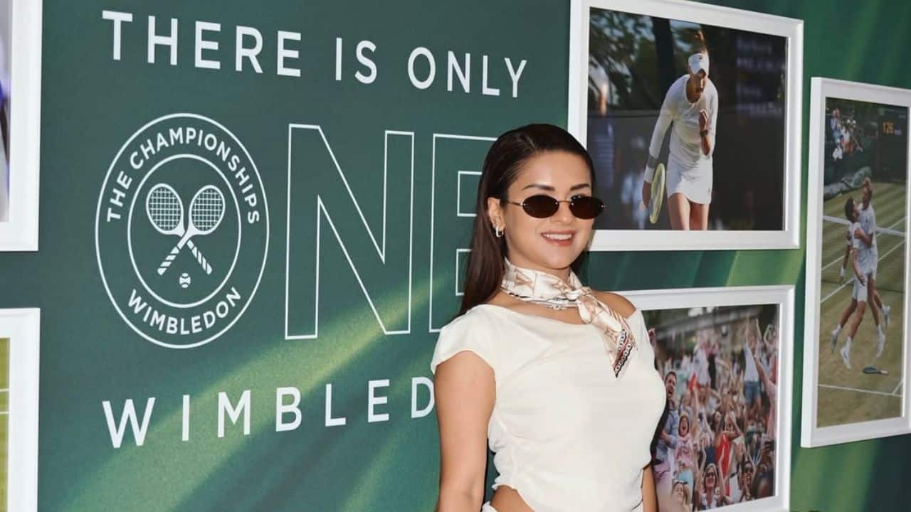 Although players are bound by Wimbledon's strict all-white dress code, guests traditionally opt for smart and polished attire. 