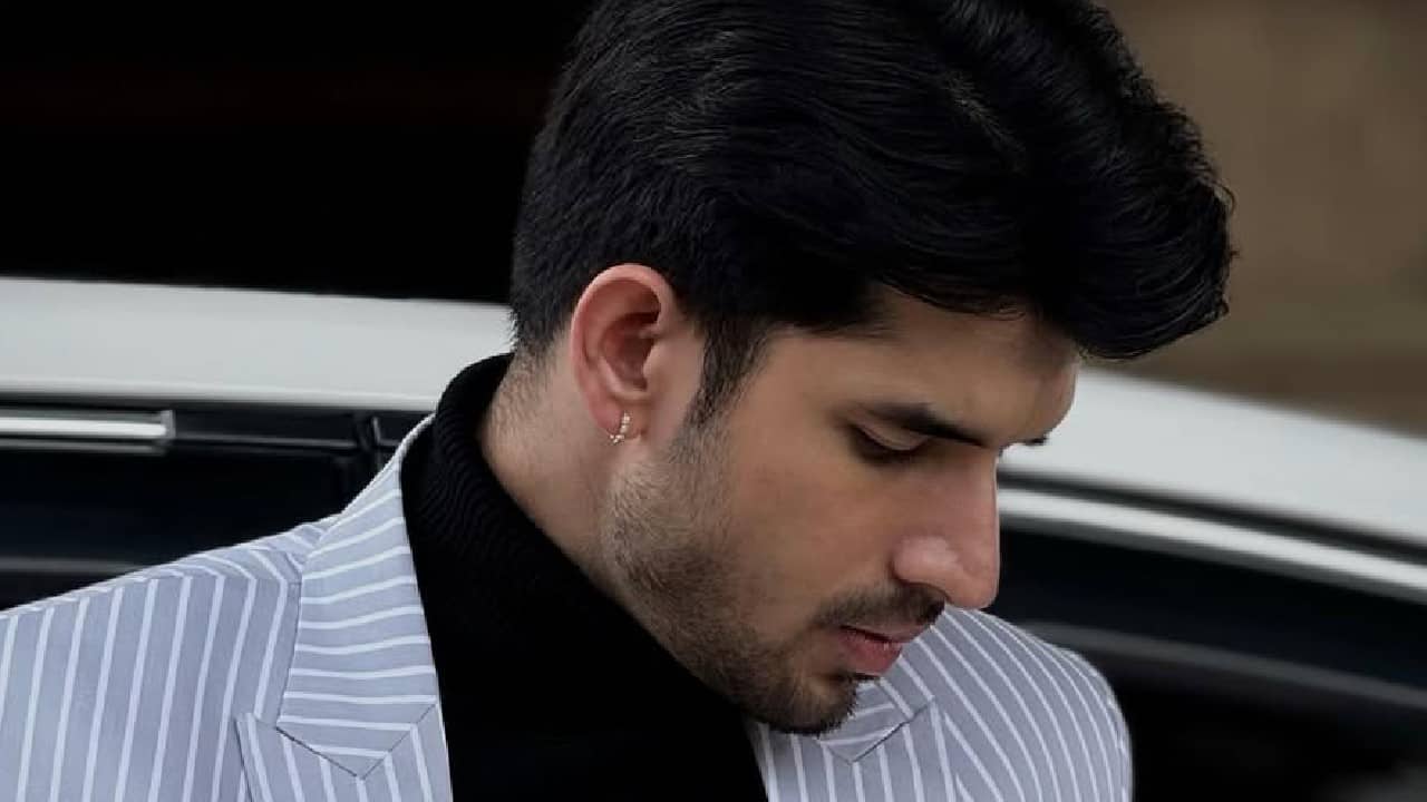 Paras looks dapper in the striped blazer and a black polo t shirt.