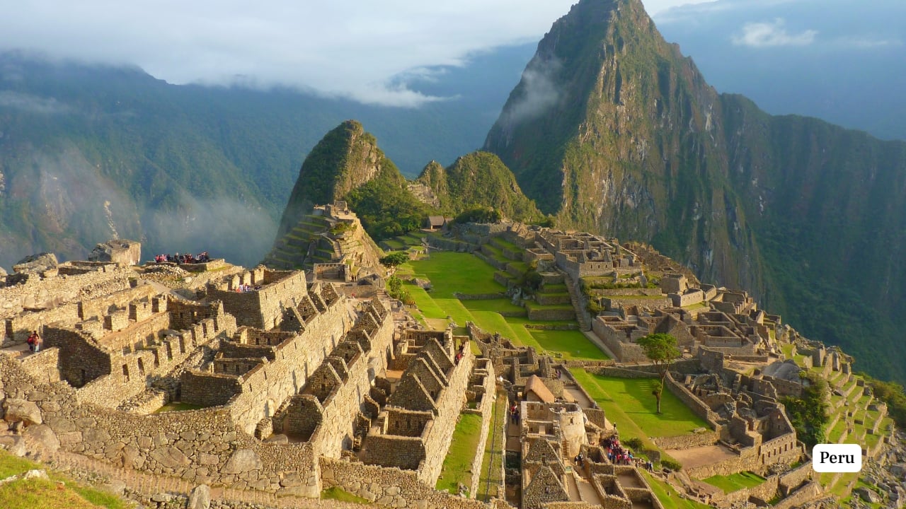 7. Peru Peru wears its history like a well-woven textile—layered and rich. The ancient city of Machu Picchu remains a global icon, but modern Lima’s gastronomic scene and the biodiversity of the Amazon rainforest offer equally compelling reasons to visit. Don’t miss Cusco, the Sacred Valley, or Lake Titicaca for a full cultural immersion. (Image: Canva)