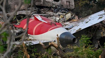 Wreckage showing the tail section of the Air India Boeing 787-8 is pictured in a residential area near the airport in Ahmedabad on June 14, 2025, after the aircraft operating as flight 171 crashed shortly after taking off on June 12. 