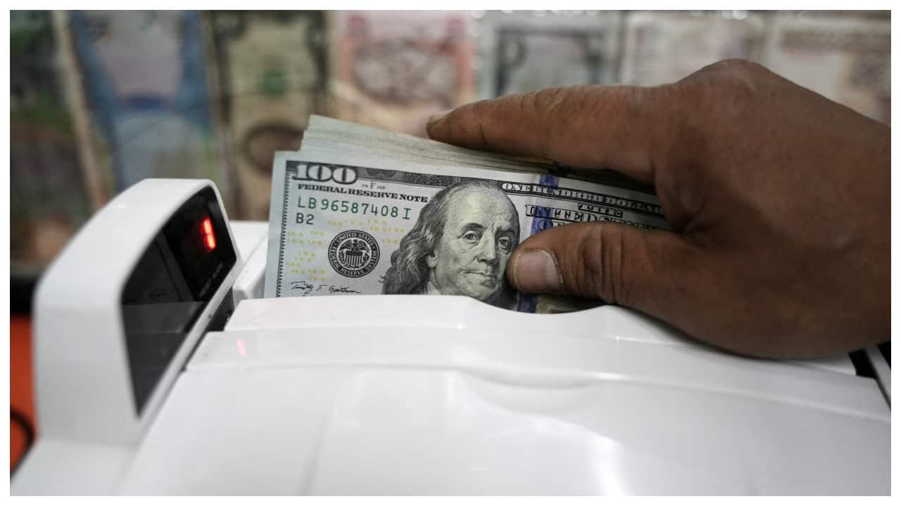 Dollar holds ground as bonds find footing, jobs data looms