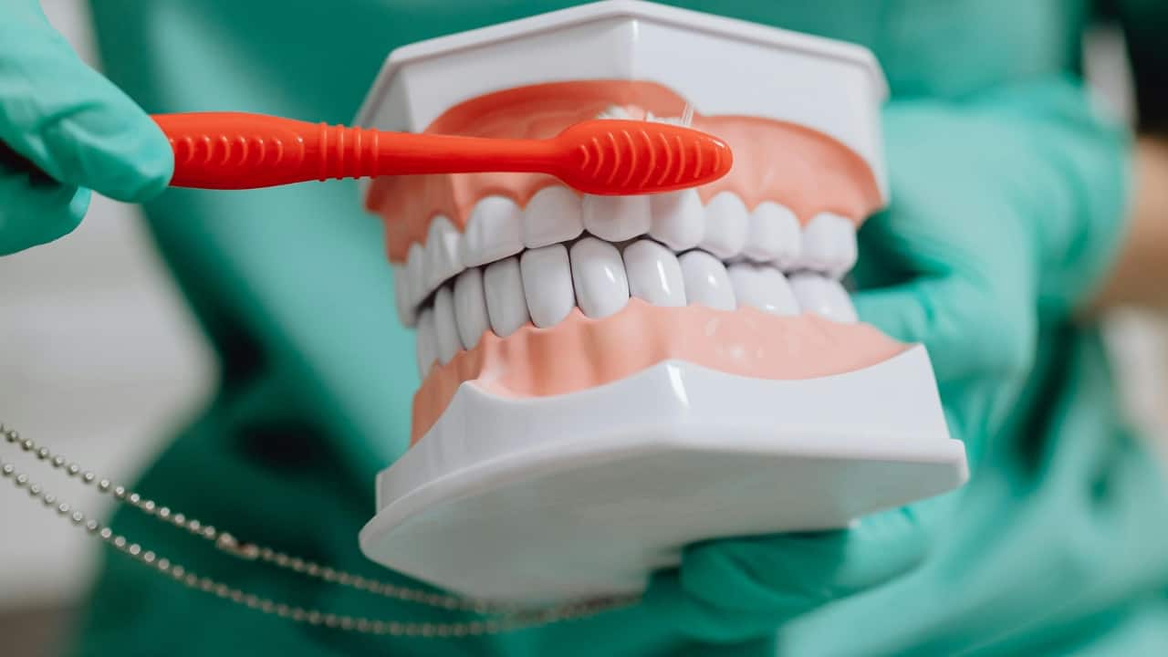 7 things your dentist wishes you knew before choosing implants or dentures