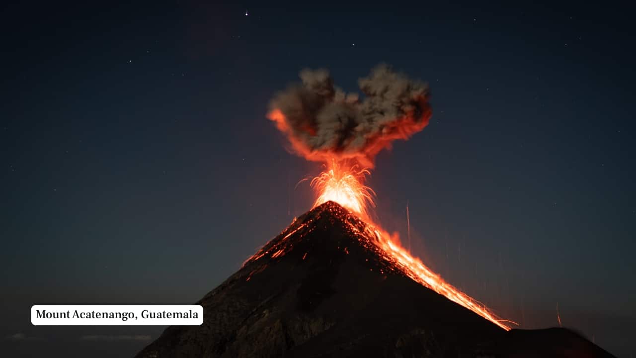 2. Mount Acatenango, Guatemala – 3,976 m Towering beside the perpetually erupting Volcán de Fuego, Acatenango offers an unparalleled vantage point for volcanic activity. The steep, high-altitude trek often involves an overnight camp above 3,500 meters, where climbers can witness fiery eruptions punctuating the night sky—an experience both humbling and otherworldly. (Image: Canva)