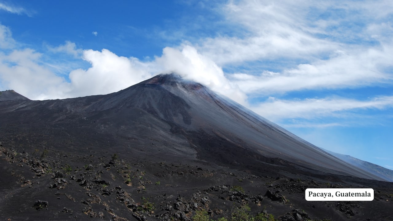 6. Pacaya, Guatemala – 2,552 m Just outside Guatemala City, Pacaya is one of Central America’s most approachable active volcanoes. Guided treks lead through lava fields and steaming terrain, often allowing visitors to glimpse recent magma flows. Its relatively modest height makes it suitable for casual hikers seeking an immersive volcanic experience. (Image: Canva)