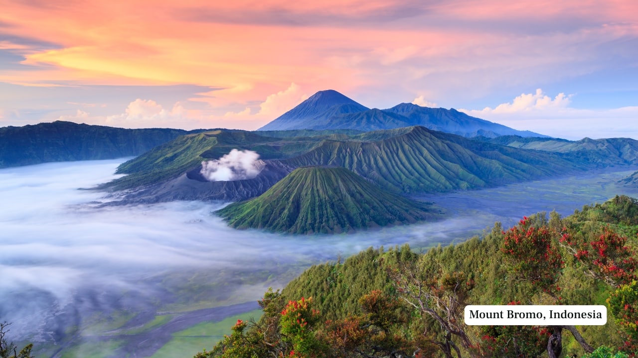 8. Mount Bromo, Indonesia – 2,329 m Part of the Tengger caldera in East Java, Mount Bromo is more accessible than it is arduous. Reached via a short hike and staircase ascent, its fuming crater is a key destination for sunrise viewings. The surreal volcanic landscape is one of Indonesia’s most photographed natural wonders. (Image: Canva)