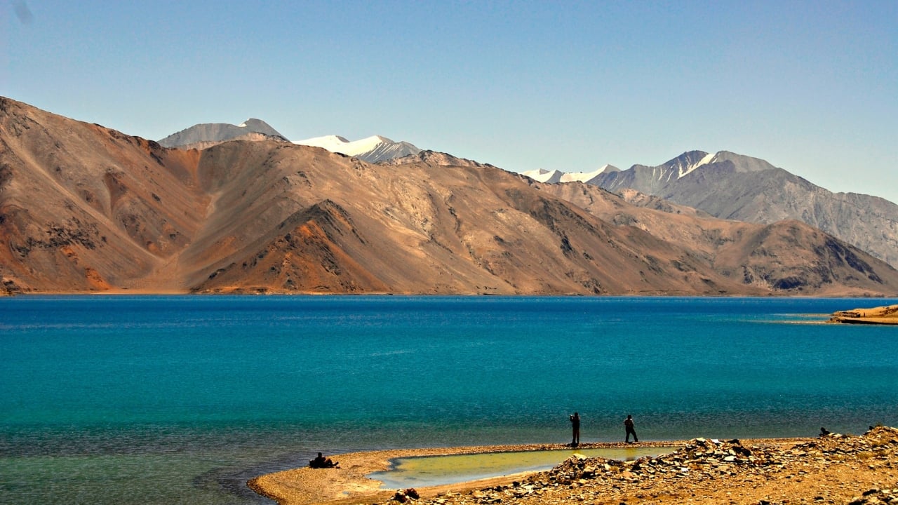 From glacial basins to meteor-formed craters, these ten lakes (and one exceptional river) illustrate the variety and visual richness of India’s natural wonders. Each offers a moment where time seems to slow—where landscape and imagination meet, and where nature paints not in oils or pastels, but in shadow, light, and silence. (Image: Canva)