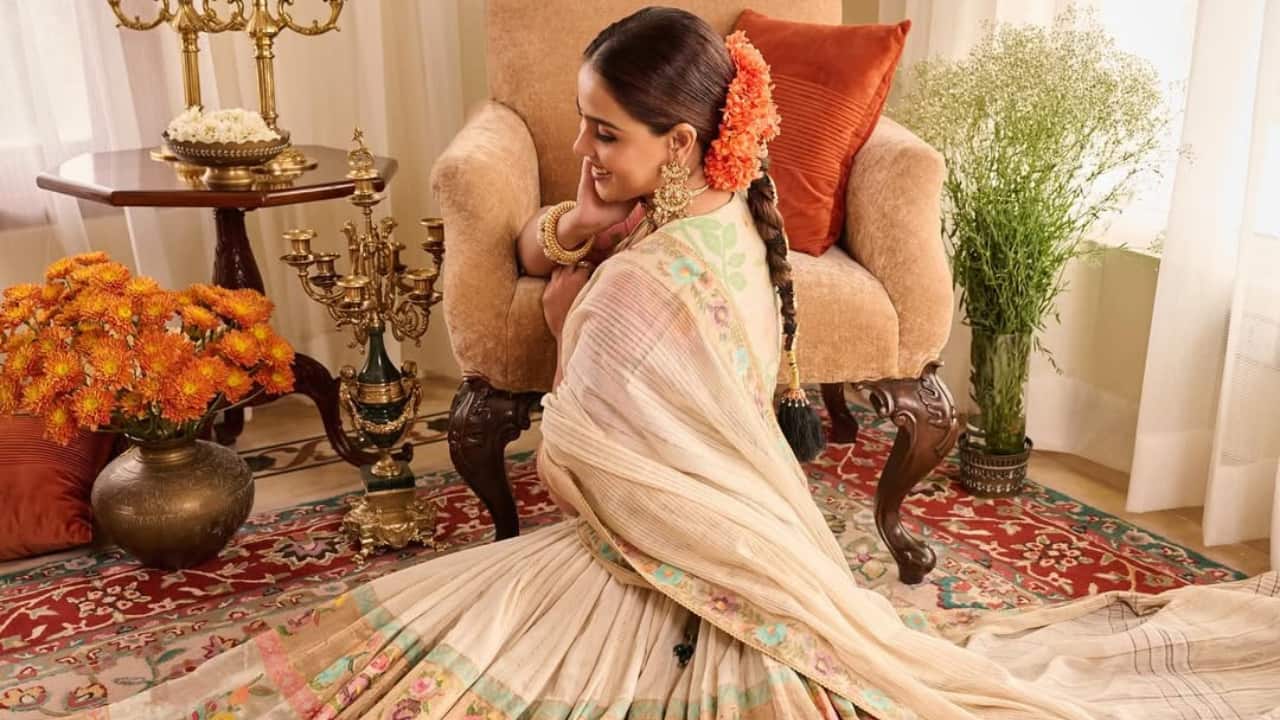 Elegant stillness Genelia strikes a different pose in a moment of calm. Seated in a regal armchair, her saree flows beautifully around her, showcasing its vibrant embroidery. She exudes Indian elegance with modern poise. Elegant stillness Genelia strikes a different pose in a moment of calm. Seated in a regal armchair, her saree flows beautifully around her, showcasing its vibrant embroidery. She exudes Indian elegance with modern poise.