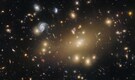 Cosmic mystery: Hubble captures hidden dark forces in galaxy cluster