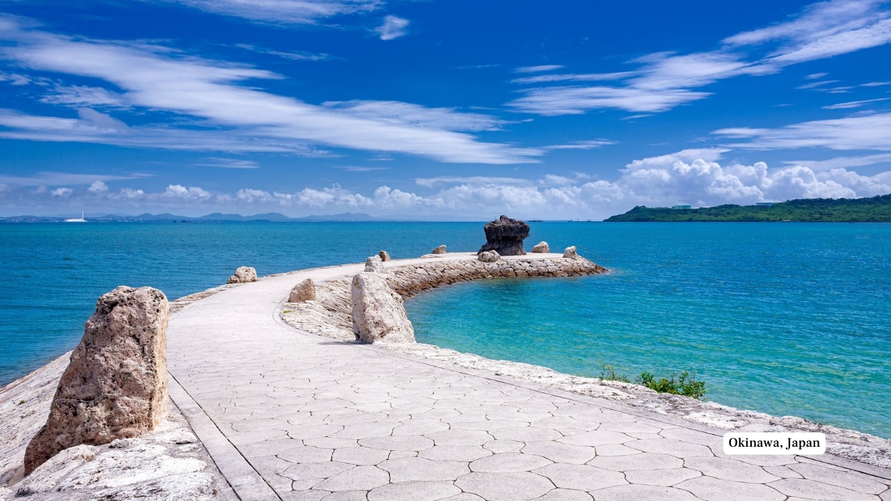 9. Okinawa, Japan A vibrant contrast to mainland Japan’s muted palette, Okinawa explodes with life. Red-tiled Ryukyuan houses, coral reefs teeming with colour, and cultural festivals in bold costume tones make this southern island a visual and cultural standout. (Image: Canva)