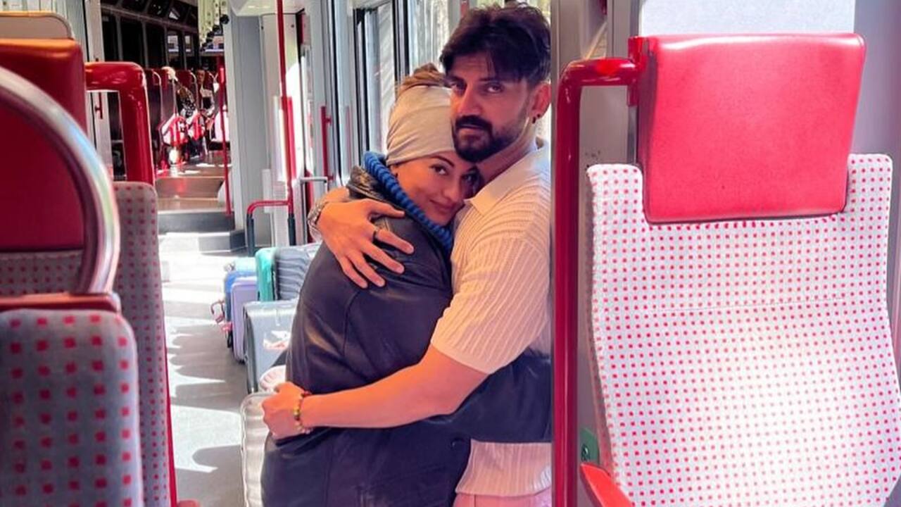 Train cuddles and Swiss smiles - Snuggled up on a scenic train ride, the couple showed us how to travel in style and comfort.