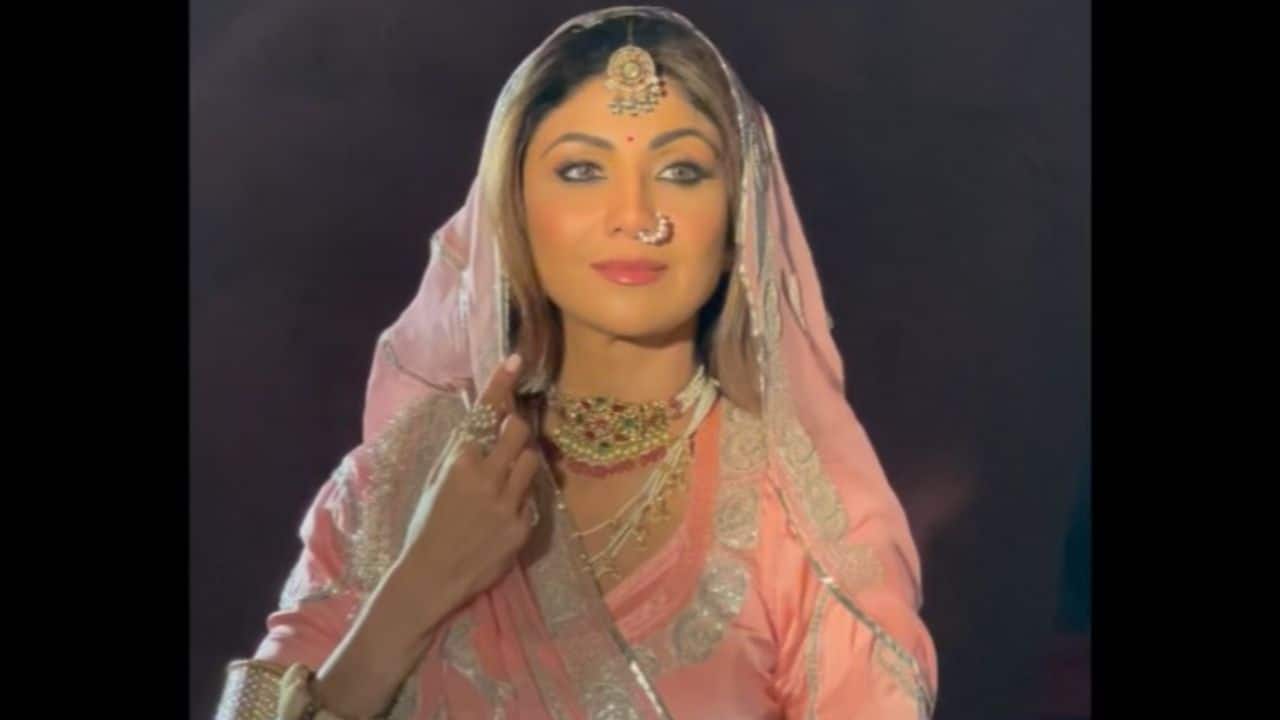 5. Poised and Elegant Demeanor Throughout the video and images, Shilpa Shetty carries the ensemble with immense grace and poise. Her postures and expressions, whether she's standing or seated, convey a sense of elegance and confidence, making her embody the royal and dignified essence often associated with traditional Rajasthani attire. 5. Poised and Elegant Demeanor Throughout the video and images, Shilpa Shetty carries the ensemble with immense grace and poise. Her postures and expressions, whether she's standing or seated, convey a sense of elegance and confidence, making her embody the royal and dignified essence often associated with traditional Rajasthani attire.