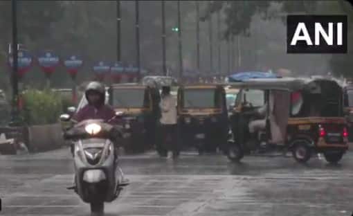 Heavy rain soaks Mumbai amid IMD's orange alert; traffic disruptions likely
