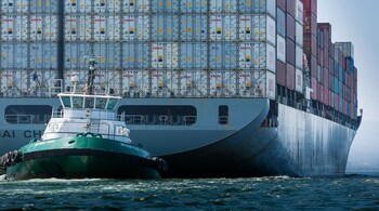 A cargo ship at the Port of Long Beach in California. Photographer: Tim Rue/Bloomberg