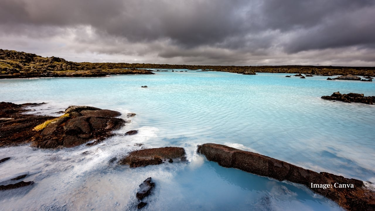 1. Blue Lagoon, Iceland Set against the stark backdrop of black lava fields, Iceland’s iconic Blue Lagoon is a geothermal spa unlike any other. Its mineral-rich waters—naturally heated by volcanic activity—draw visitors year-round for both wellness and wonder. (Image: Canva)