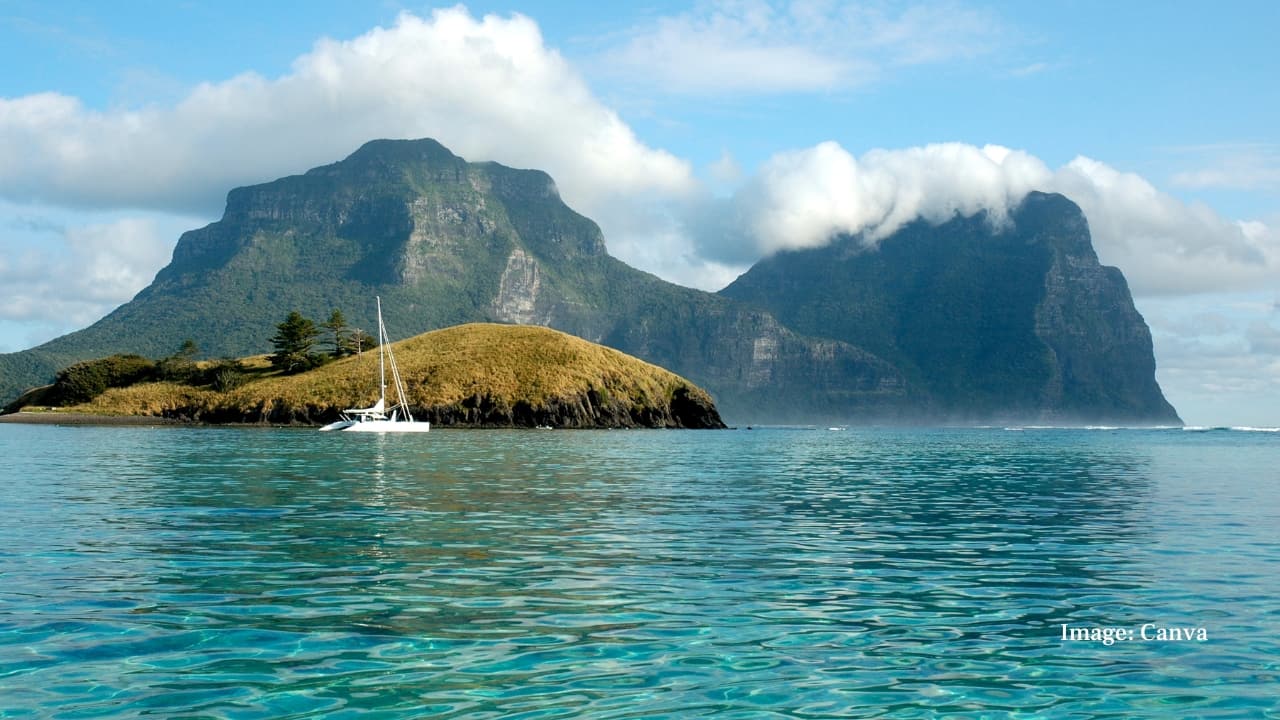 10. Lord Howe Lagoon, Australia Bordered by the world’s southernmost coral reef, this azure lagoon is teeming with marine life and framed by volcanic peaks. A UNESCO site, it’s as pristine as it is rare. (Image: Canva)