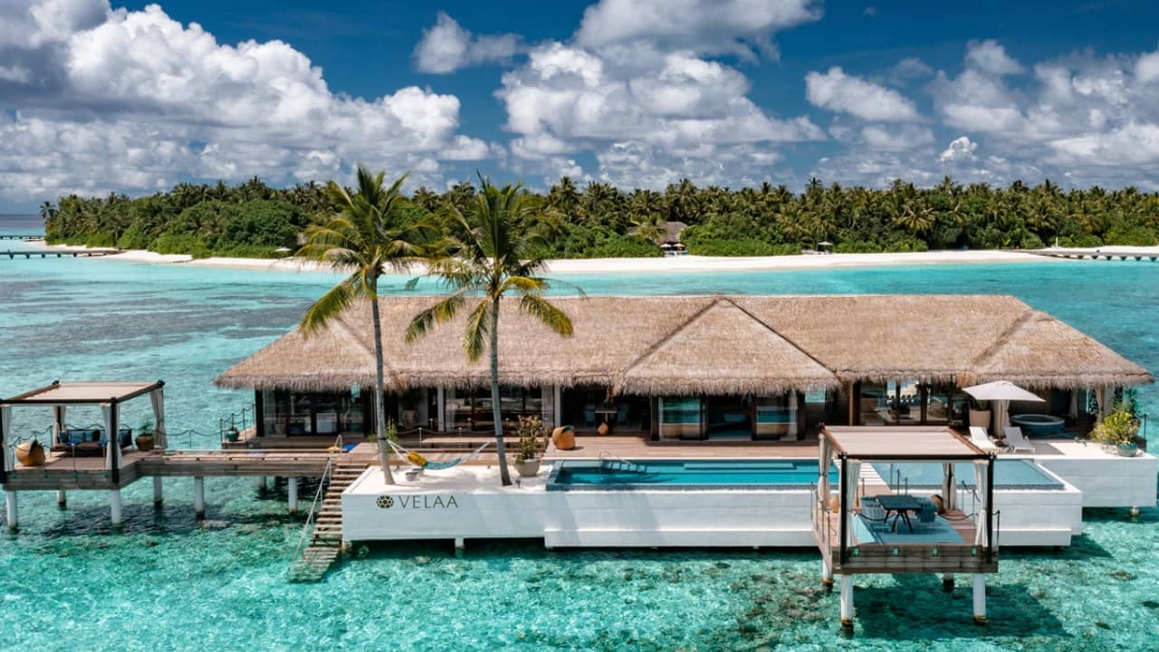 2. Velaa Private Island, Maldives Located in Noonu Atoll, Velaa fuses fairytale charm and grown-up indulgence—from Technogym workouts to overwater villas, padel courts, and one of the Maldives’ most refined wellness retreats, designed with family and privacy in mind. (Image: Velaa Private)