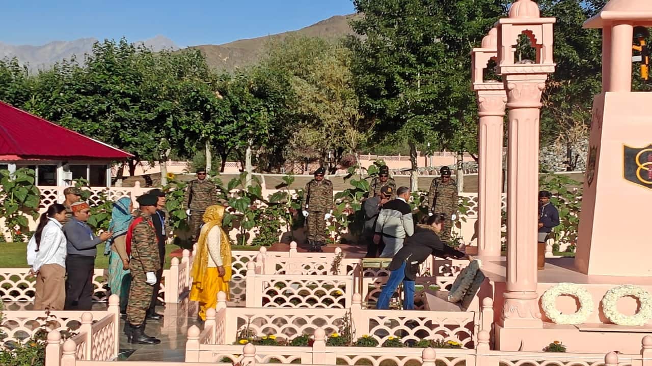 Family members of martyrs pay tribute at the Kargil War Memorial to commemorate the 26th Kargil Vijay Diwas, at Drass in Ladakh's Kargil early Saturday morning.