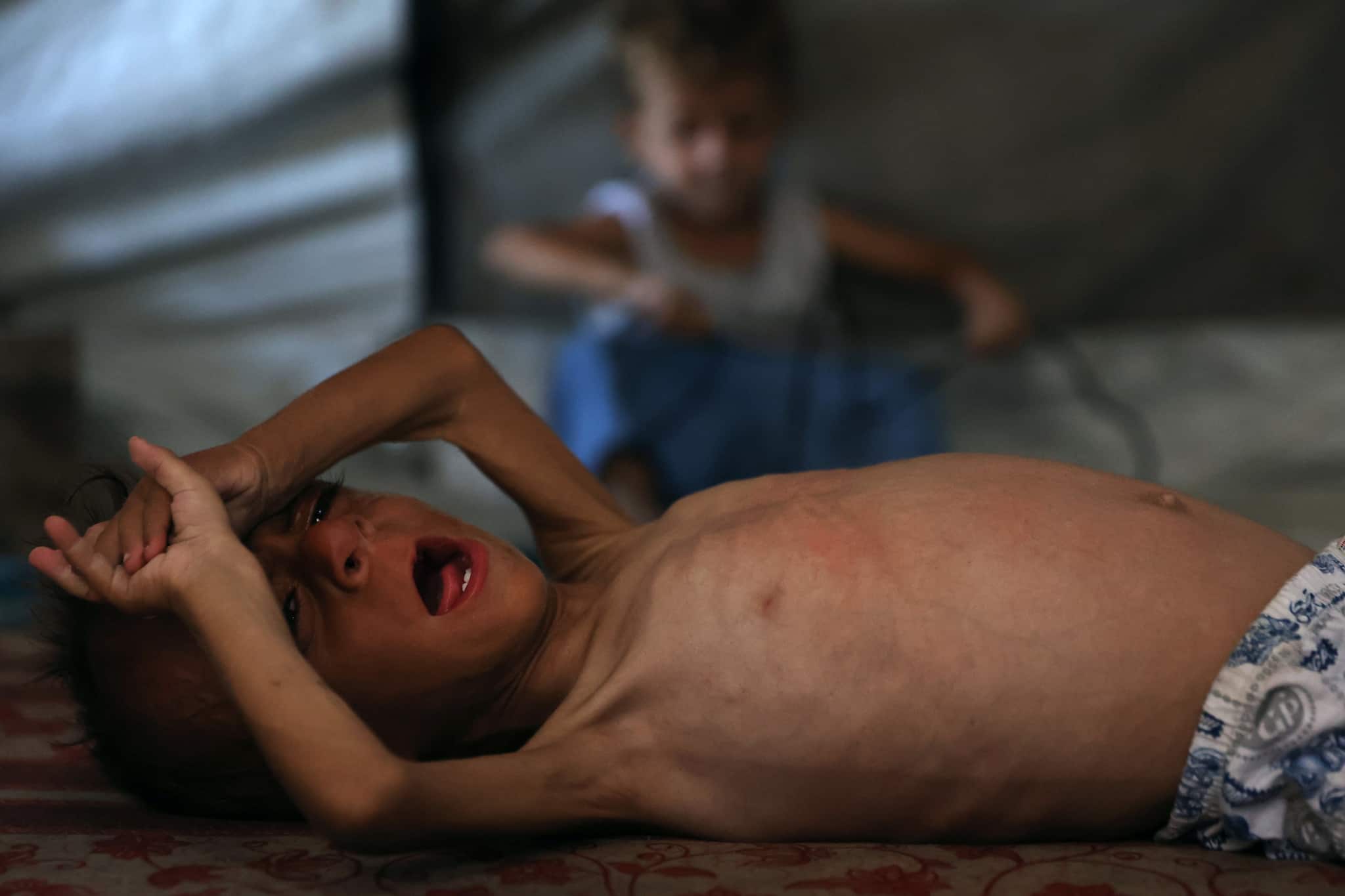 Starvation looms in Gaza; Israel greenlights international food drops | SEE PICS