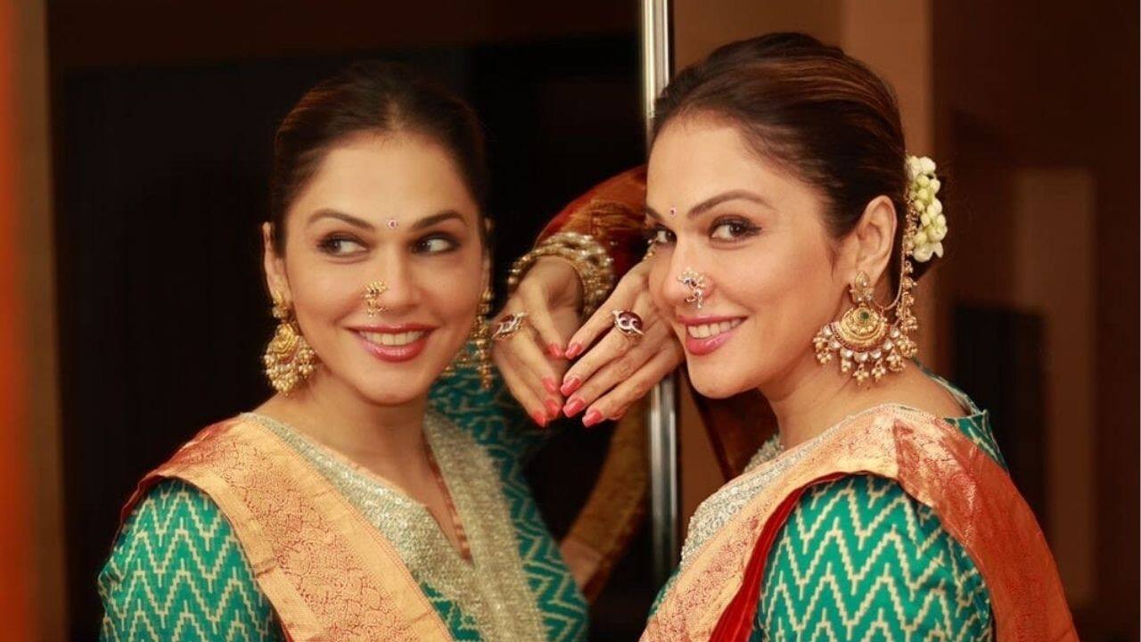 With its unique golden border, this mint green chudidaar epitomises modern festive attire. Beautiful movement is produced by the textured fabric and flowing silhouette, and a hint of regal sophistication is added by the contrasting golden trim. With its unique golden border, this mint green chudidaar epitomises modern festive attire. Beautiful movement is produced by the textured fabric and flowing silhouette, and a hint of regal sophistication is added by the contrasting golden trim.