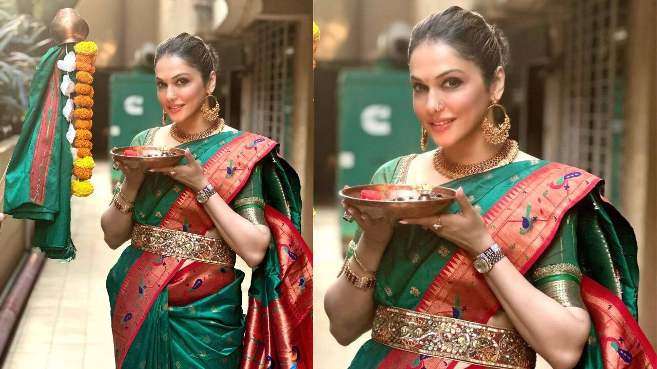 The epitome of classic Indian elegance is this stunning green silk saree with a red border and coral pink accents. The lustrous silk fabric drapes beautifully to create a classic saree silhouette, while the coral pink border with delicate motifs beautifully contrasts with the rich emerald green base. The epitome of classic Indian elegance is this stunning green silk saree with a red border and coral pink accents. The lustrous silk fabric drapes beautifully to create a classic saree silhouette, while the coral pink border with delicate motifs beautifully contrasts with the rich emerald green base.