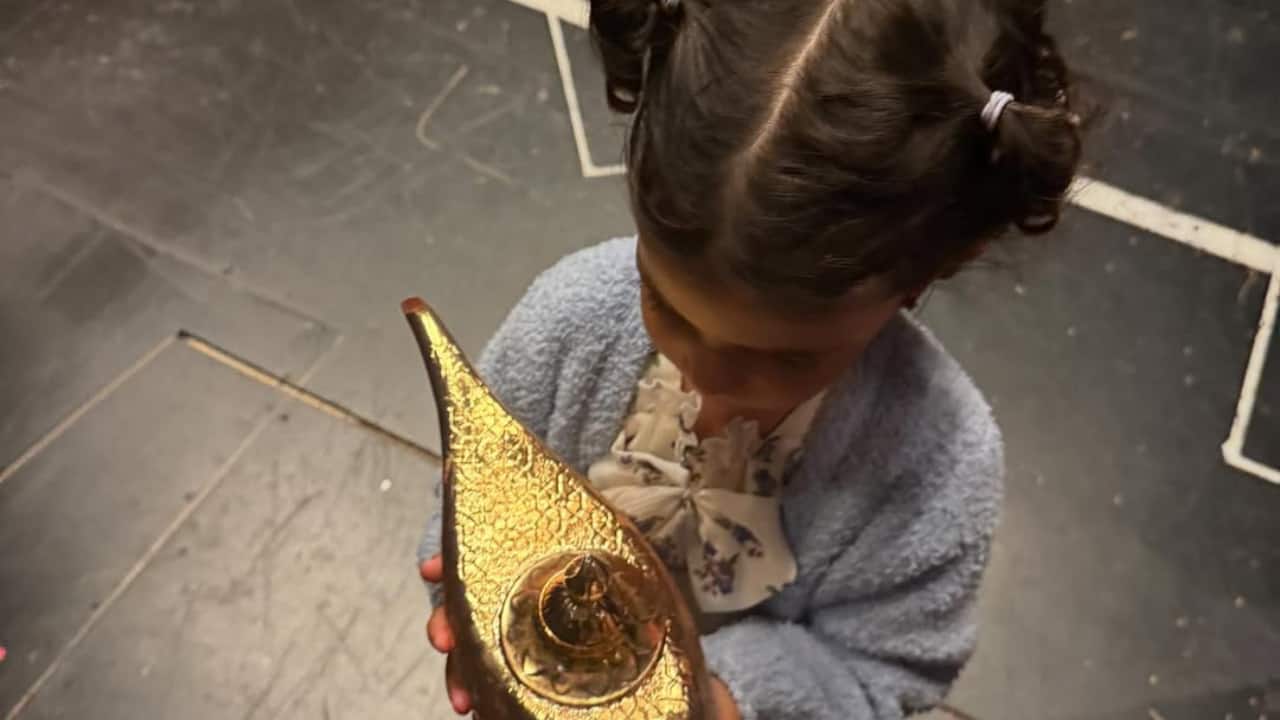 Malti meets the magic lamp Priyanka shared a sweet photo of little Malti curiously playing with Aladdin's famous lamp. Another cute moment captured her talking with the Genie, while Priyanka could be heard fondly saying, &quot;She's in awe at the moment.&quot;