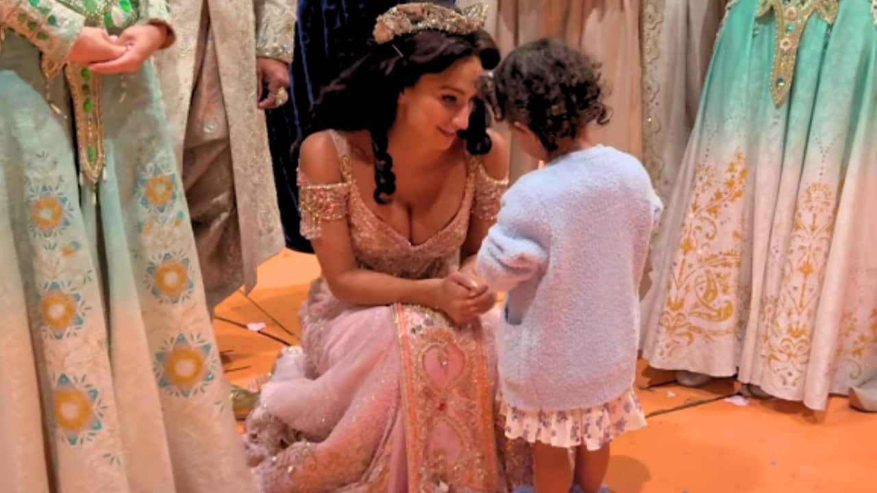 Family Moment with the cast Priyanka, Nick and their daughter, Malti, posed with the cast of Aladdin, including leads Adi Roy as Aladdin, Sonya Balsara as Jasmine, and the lively Genie. They flashed smiles for the photo, reflecting the joy of the evening, creating a perfect family memory.